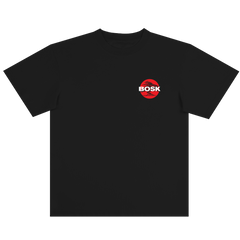 The BOSK Circle Bonsai Tee is a classic-fit black t-shirt made from heavyweight cotton, featuring a small red circle with "BOSK" in bold white letters and tree ring patterns on the left chest.