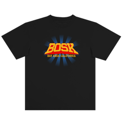 The Super Power Tee by BOSK is a black, heavy-weight cotton shirt with bold yellow and orange "BOSK" text above "BAY AREA CALIFORNIA" in yellow, plus blue rays radiating across the classic-fit chest.